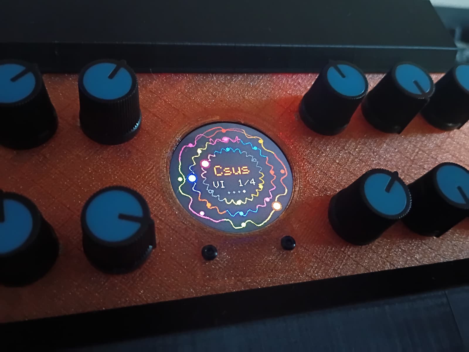 The assembled front panel, the screen playing a Csus chord
